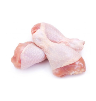 Three raw Chicken Drumsticks stacked together on a white background.