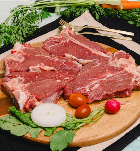 Three raw beef steaks garnished with rosemary and garlic on a golden platter, emphasizing Halal Meat, Raised Right, Prepared With Purpose, with the USDA logo.
